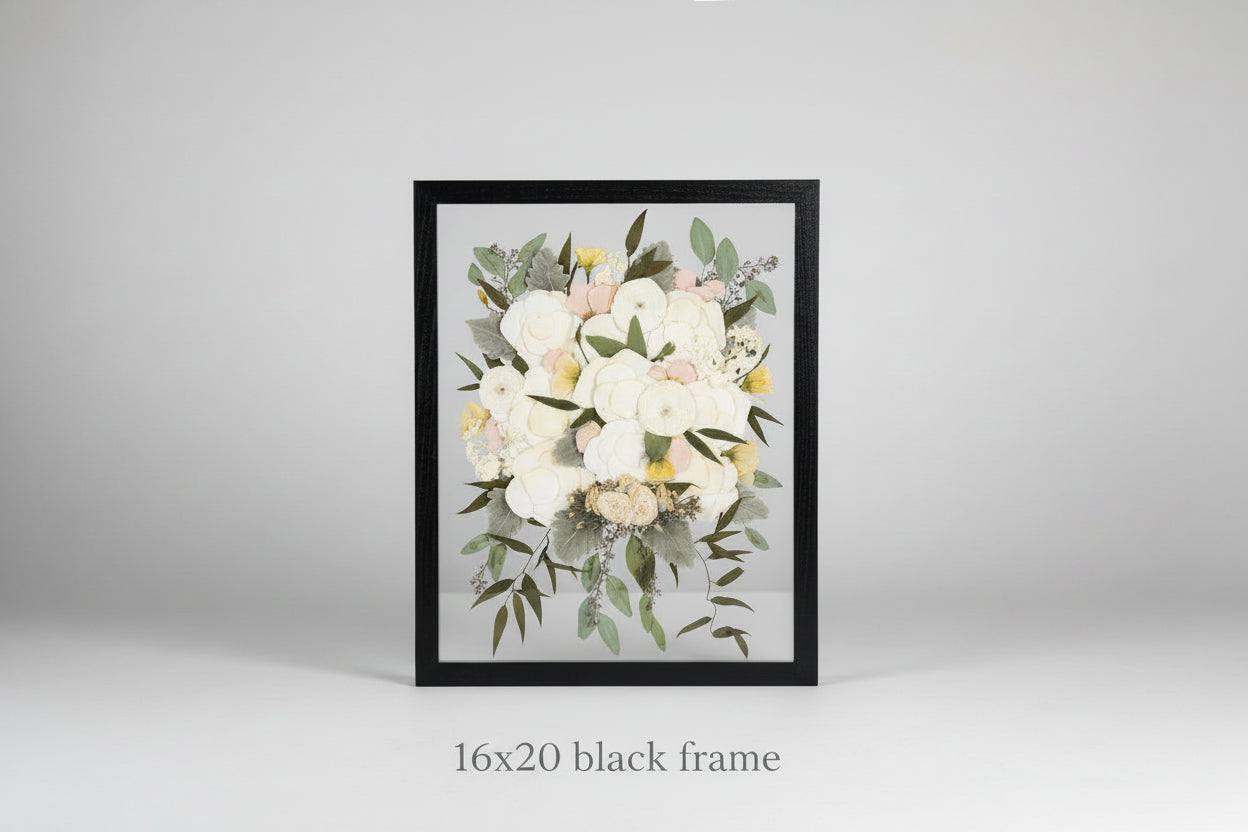 Framed artwork of a floral bouquet on a white background