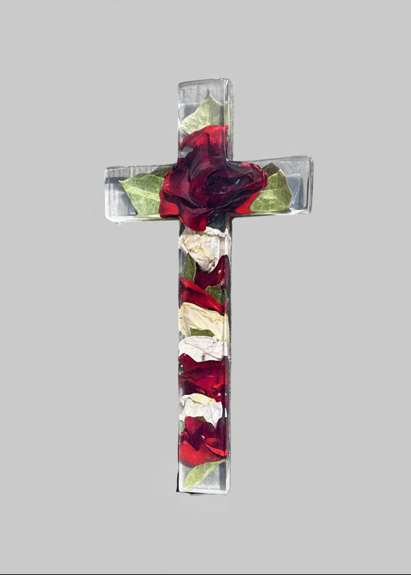 Decorative cross with red and green flowers on a gray background