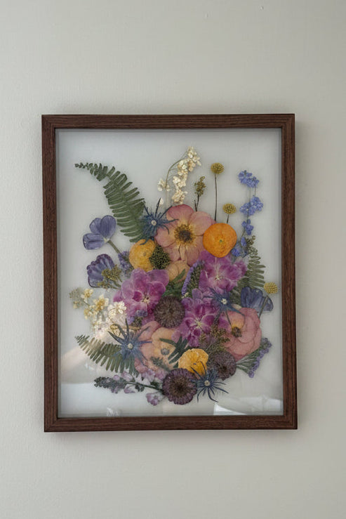 Pressed Floral Frame with dark wood and bright colored flowers