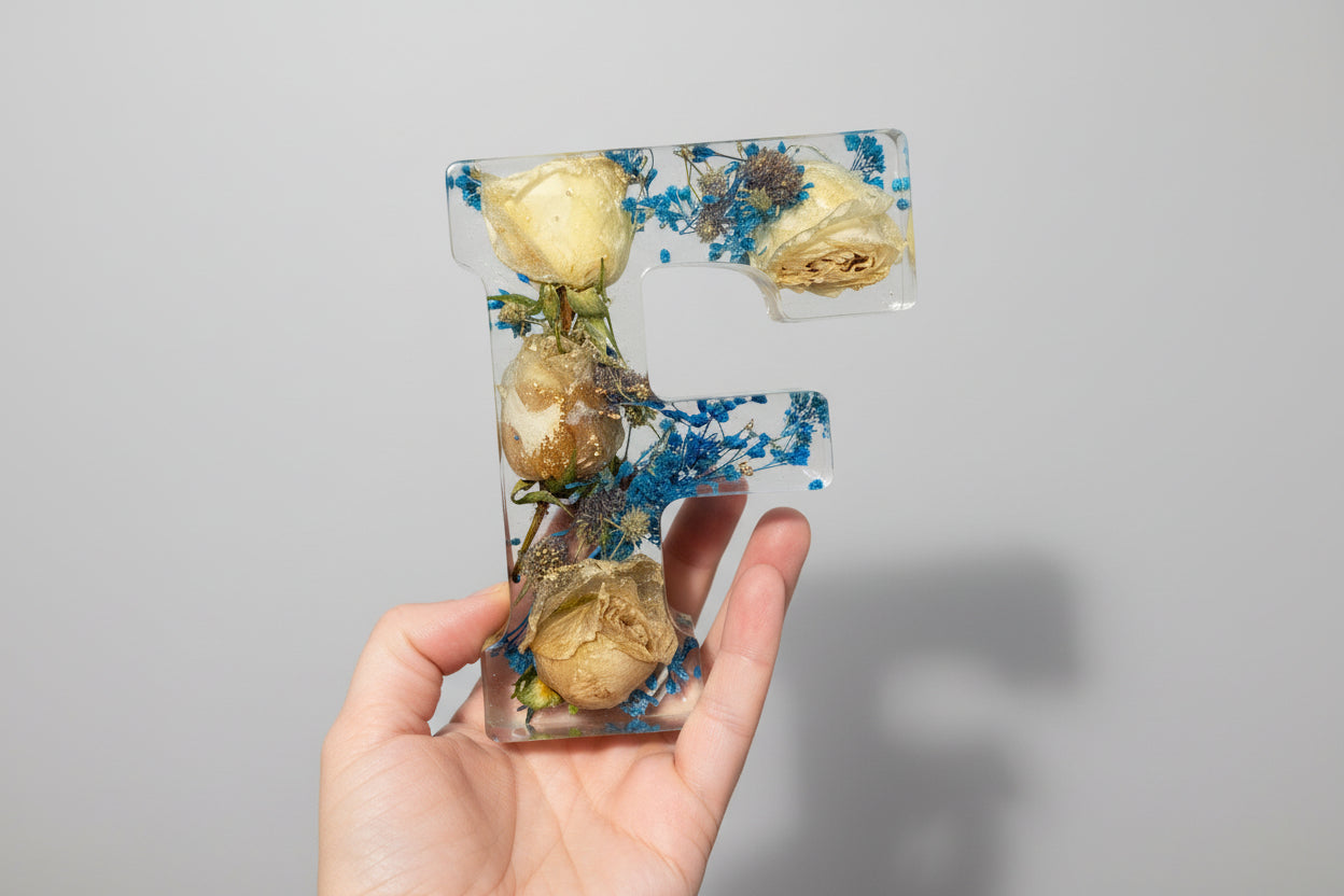 Resin Letter F in hand