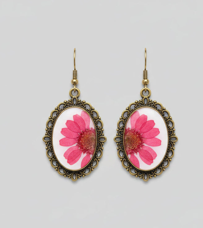 pair if flower earrings in vintage style oval bezel