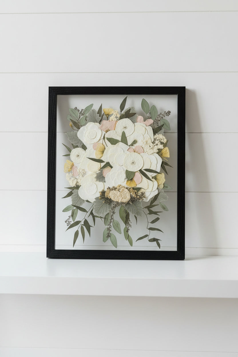 Framed artwork of a floral bouquet on a white background
