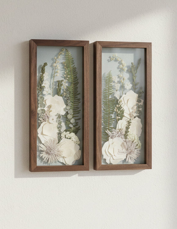 2 wood frames with white flowers inside