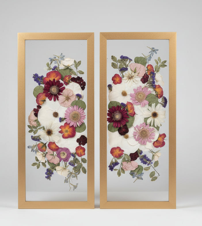 2 wood frames with colorful flowers inside