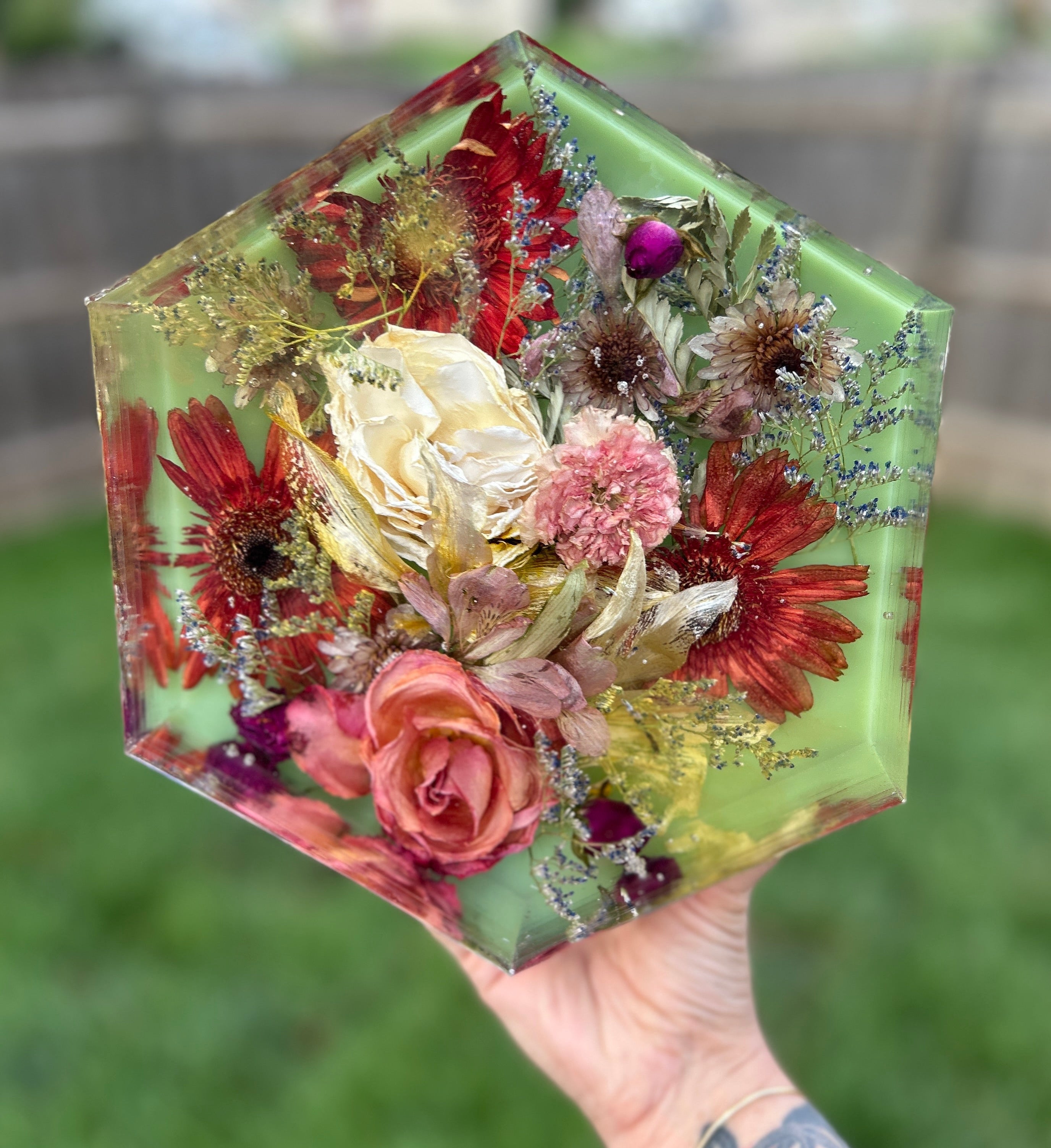 Preserved Flowers in Resin Hexagon Shape with a green background
